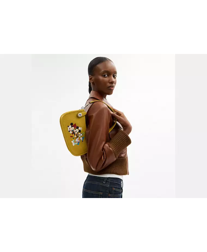 Disney X Coach Swinger Bag In Regenerative Leather With Mickey Mouse And Friends